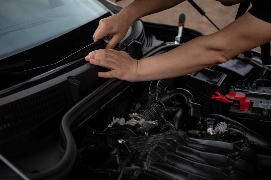 Mechanic fixing windshield